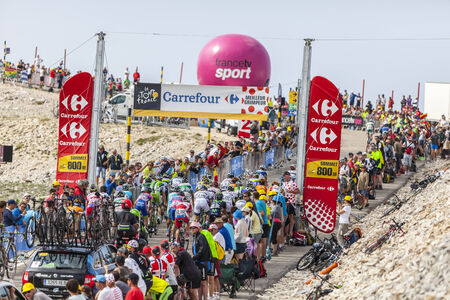 Le Mont Ventoux,France- July 14, 2013: The peloton climbing the last 800 meters on the road to Mount Ventoux during the stage 15 of the 100 edition of Le Tour de France on July 14 2013.のeditorial素材