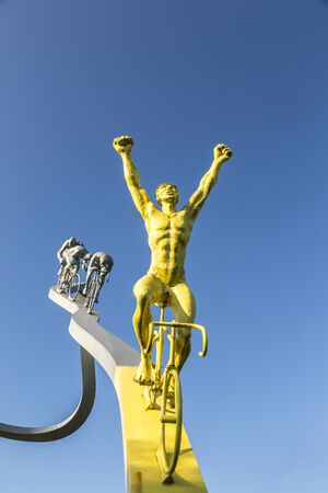 Soumoulou,France - July 23,2014: Detail of the monumental sculpture \"Tour de France in Pyrenees\" by Jean-Bernard Metais, located on the Area of the Pyrenees from the  A64 motorway  between Tarbes and Pau. The monument represents the ascensions of the roのeditorial素材