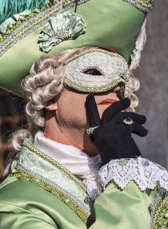 Venice, Italy- February 18th, 2012: Portrait of a man disguised in a beautiful costume as the count Casanova posing during the Venice Carnival days.のeditorial素材