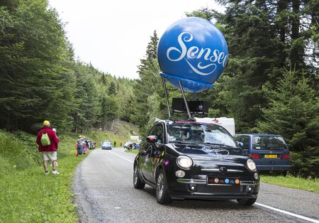 Col de Platzerwasel, France - July 14, 2014: Fancy vehicle of Senseo passing in the Publicity Caravan on the road to mountain pass Platzerwasel, in Vosges Mountains during the stage 10 of Le Tour de France on 23 July 2014.Senseo is a registered trademark のeditorial素材