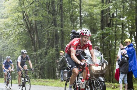 Col de Platzerwasel,France - July 14, 2014: The cyclist Lars Bak of Lotto Belisol Team, climbing the mountain pass Platzerwasel in Vosges Mountains during the during the stage 10 of Le Tour de France 2014のeditorial素材