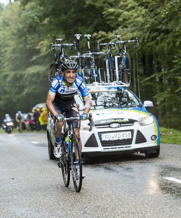 Col de Platzerwasel,France - July 14, 2014: The cyclist Tiago Machado of NetApp-Endura Team, suffering after a crash while climbing the mountain pass Platzerwasel in Vosges Mountains during the during the stage 10 of Le Tour de France 2014のeditorial素材