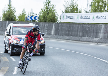 Coursac France  July 26 2014: The French cyclist Amael Moinard  BMC RacingTeam pedaling  on a steep slope in front of spectators during the stage 20  time trial Bergerac  Perigueux of Le Tour de France 2014.のeditorial素材