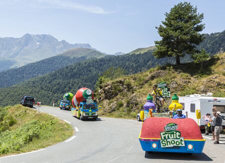 Col D'Aspin,France- July 15,2015: Teisseire Caravan during the passing of the Publicity Caravan on the Col d'Aspin in Pyerenees Mountains in the stage 11 of Le Tour de France 2015.Teisseire produces fruit juices and syrups for the food service industry.のeditorial素材