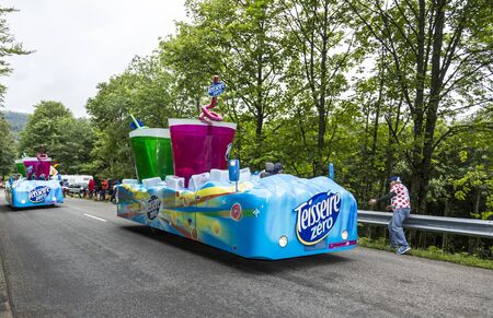 Le Markstein, France- July 13, 2014:Vehicles advertising Teisseire during the passing of the...