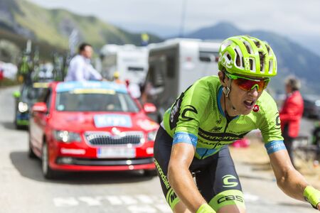 Col de la Croix de Fer, France - 25 July 2015:The Lituanian cyclist Ramunas Navardauskas of 	Cannondale-Garmin Team leading the race, riding to the Col de la Croix de Fer in Alps during the stage 20 of Le Tour de France 2015.のeditorial素材