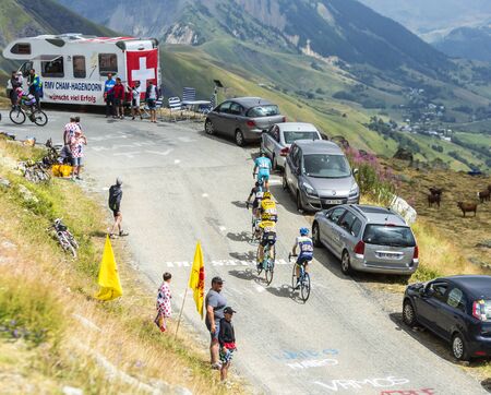 Col de la Croix de Fer, France - 23 July 2015:Group of five cyclists climbing to the Col de la Croix de Fer in Alps during the stage 20 of Le Tour de France 2015.のeditorial素材