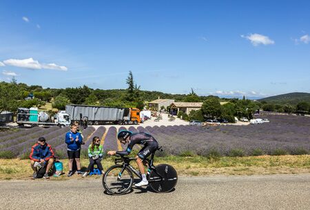 Les Arredons,France - July 15,2016: The British cyclist Luke Rowe of Team Sky riding during an individual time trial stage near a field of lavanda in Ardeche Gorges during Tour de France 2016.のeditorial素材