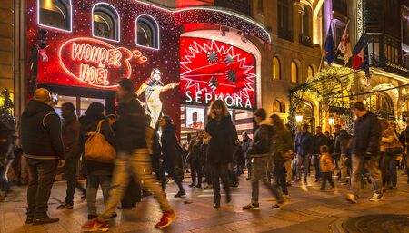 Paris,France - 27 November 2016: Crowd of people walking in front of Sephora Shop on the famous...