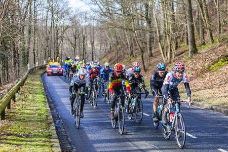 Cote de Senlisse, France - 5 March, 2017: Image of the peloton in full effort climbing on Cote de Senlisse during the first stage of Paris-nice on 05 March 2017.のeditorial素材