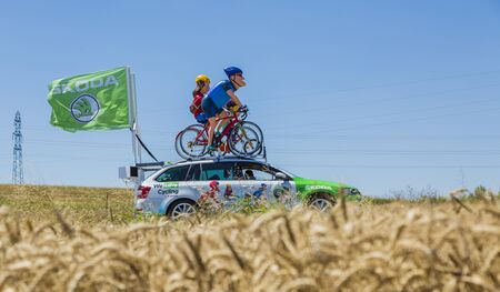 Saint-Quentin-Fallavier, France - July 16, 2016: The family mascot of Skoda during the passing of Publicity Caravan in a wheat plain in the stage 14 of Tour de France 2016. Skoda provides the official car of the competition and it sponsors The Green Jerseのeditorial素材