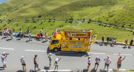 Col de Peyresourde,France- July 23, 2014: BIC vehicle passing in the Publicity Caravn on the road to Col de Peyresourde in Pyrenees Mountains during the stage 17 of  Le Tour de France 2014.BIC is a global company which offers an extensive line of writing のeditorial素材