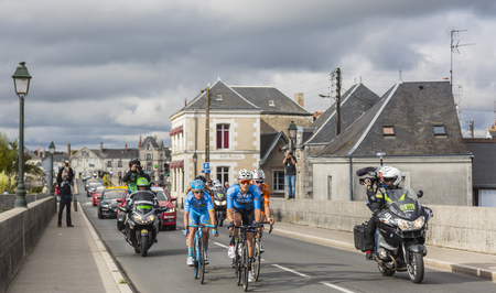 Amboise,France - October 8,2017: The breakaway passing on the bridge in Amboise during the Paris-Tours road cycling race.のeditorial素材