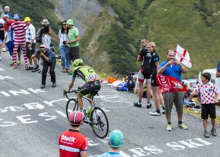 Col du Glandon, France - July 24, 2015: The Canadian cyclist Ryder Hesjedal of Cannondale-Garmin Team,climbing the road to Col du Glandon in Alps, during the stage 19 of Le Tour de France 2015.のeditorial素材