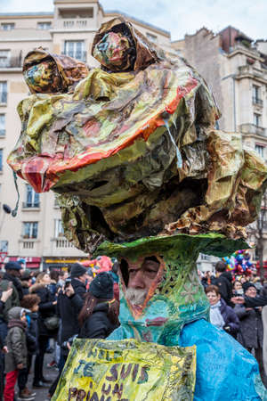Paris, France - February 11,2018: Street portrait of a disguised person like a frog during the Carnaval de Paris 2018.のeditorial素材