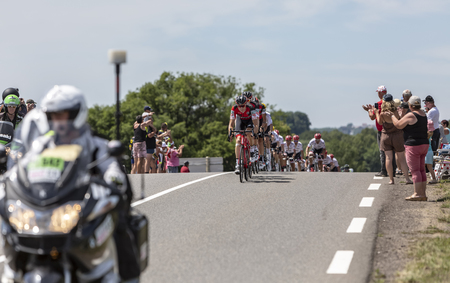 Mailleroncourt-Saint-Pancras, France - July 5, 2017: The Swiss cyclist Michael Schar leading the BMC Team in front of the peloton on a road to La Planche des Belle Filles during the stage 5 of Tour de France 2017.のeditorial素材