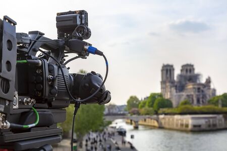 Close-up image of a television professional rig broadcasting from Notre Dame Cathedral surroundings...