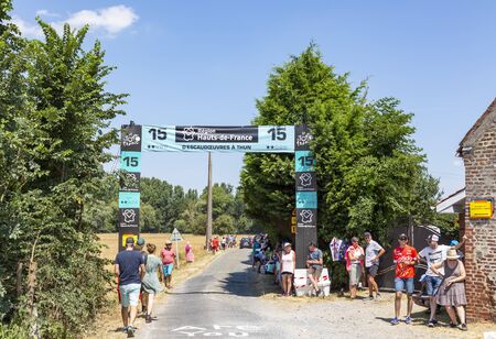 Pave Escaudoeuvres a Thun, France - July 15 , 2018: Spectators waiting for the cyclists at the entrance on a cobbelstone road sector, during the stage 9 of Le Tour de France 2018のeditorial素材
