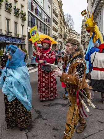 Paris, France - February 11,2018: Group of disguised people walking in the street during the Carnaval de Paris 2018.のeditorial素材