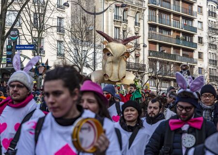 Paris, France - February 11,2018: Image of a mascot above the crowd during the Carnaval de Paris 2018.のeditorial素材