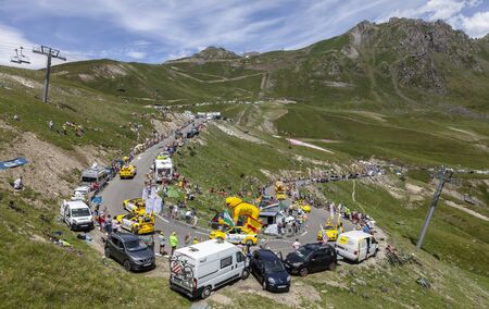 Col du Turmalet, France - July 27, 2018: The Publicity Caravan climbing the road to Col du Tourmalet in Pyrenees during the 19 stage of Tour de France 2018.のeditorial素材