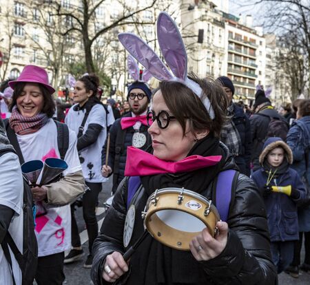 Paris, France - February 11,2018: Portrait of woman musicant perfoming in the street during the Carnaval de Paris 2018.のeditorial素材