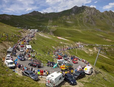 Col du Turmalet, France - July 27, 2018: Technical vehicles are climbing,after the peloton, the road to Col du Tourmalet in Pyrenees during the 19 stage of Tour de France 2018.のeditorial素材
