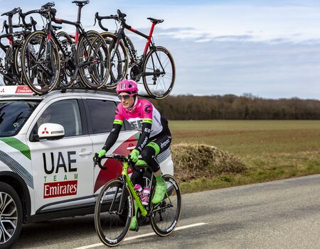 Fains-la-Folie, France - March 5, 2018: The French cyclist Pierre Rolland of EF Education First-Drapac Team riding on a country road during the stage 2 of Paris-Nice 2018.のeditorial素材