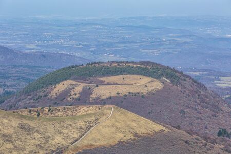 Winter volcanic landscape located in the Central Massif in France.の写真素材