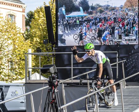 Chartres, France - October 13, 2019: The British cyclist Lars Ytting Bak of Team Dimenssion Data going down from the podium during the teams presentation before the autumn French cycling race Paris-Tours 2019. This was his last race as a professional cyclのeditorial素材