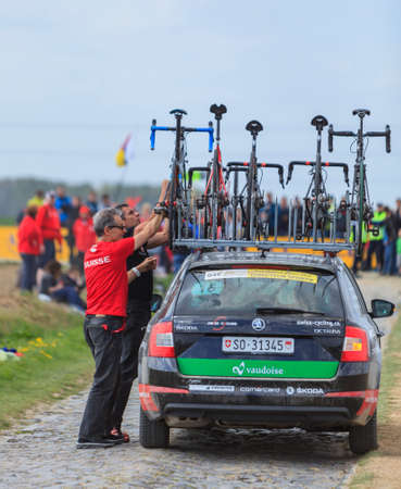 Camphin-en-PÃ©vÃ¨le, France - April 13, 2014: Unidentified technical staff team members...