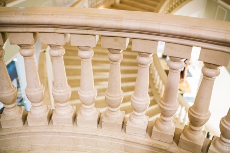 Close up view of a marble balustrade section inside a luxurious hotelの写真素材