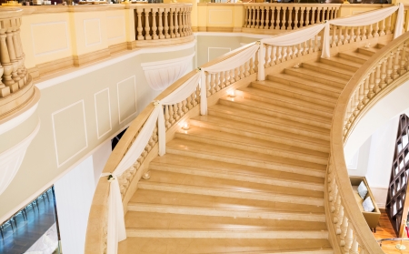 Interior marble stairs decorated with flowers and candles for weddingのeditorial素材