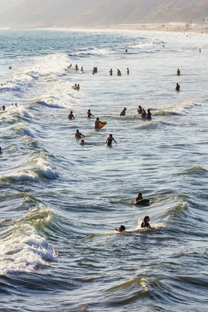 Los Angeles, CA, USA - may 2013:  People enjoying Pacific Ocean's waves のeditorial素材