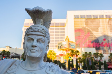 Las Vegas, NV, USA - 13th July 2013: Gladiator statue in front of Caesar's Palace Hotel. Flamingo Las Vegas Hotel in the  background.のeditorial素材