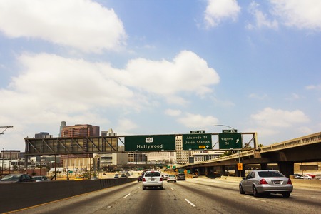 Los Angeles, CA, USA - 27th may 2013: Cars driving on highway to Hollywoodのeditorial素材
