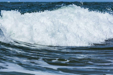 A closeup with big and tumultuous waves.
