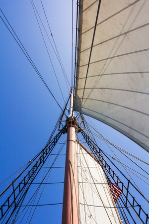 Graphic capture of a mast over blue sky.の写真素材