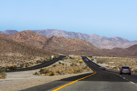 A road that leads to mountainsの写真素材