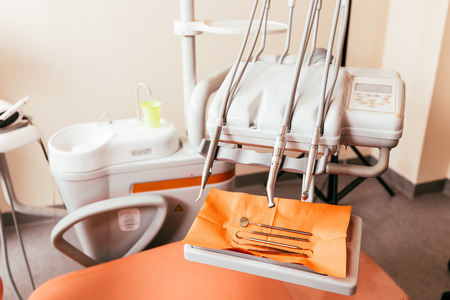 Dentist tool rack in modern dental office. Focus on hand pieces.の写真素材