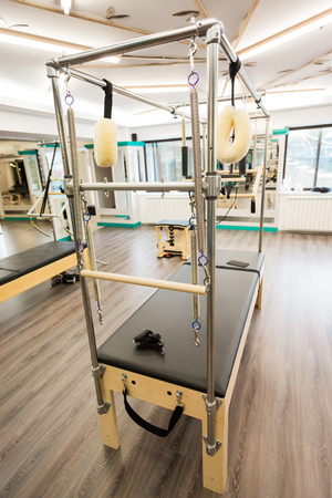 Pilates equipment indoors. Cadillac close-up.の写真素材