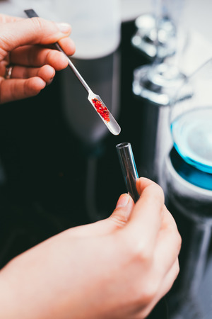 Scientist carrying out experiments in a labの写真素材