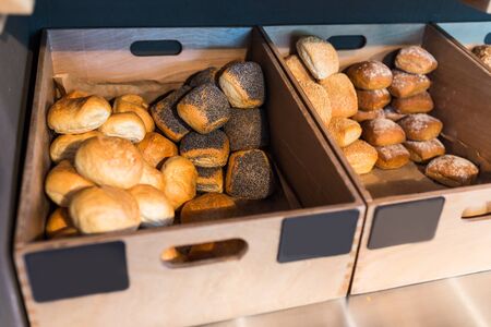 Breadbaskets full with many types of buns
