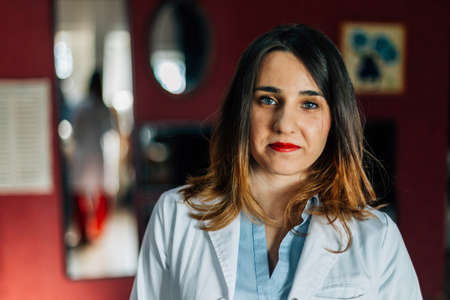 A friendly look from a woman doctorの写真素材