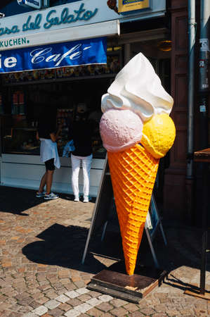 Frankfurt ,Germany - August 22, 2015:  Closeup of a big cup of ice cream in front of an ice cream store in Frankfurt.のeditorial素材