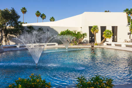 Phoenix, AZ, USA - May 18, 2013: Fountains and pool near City Hall.