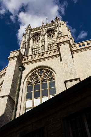 Side view of the tower of The Cathedral of Our Lady in Antwerp, Belgium.の写真素材