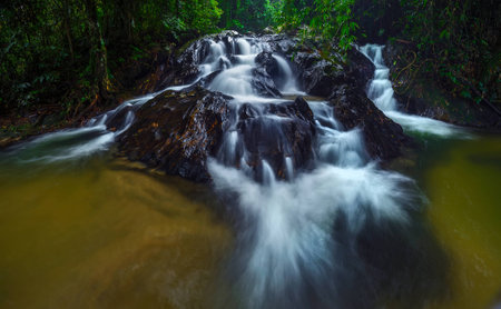 Long exposure of view hidden Templer Park's waterfall at Rawang, Selangor. Image contain excessively noise/sharp or blur due to long exposure.の写真素材