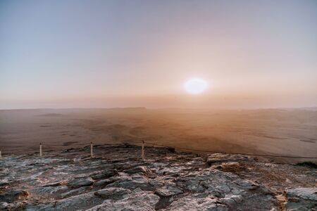 Sunrise in Israel dry negev desert. Amazing view on mountaines, rocks and sky. National park...