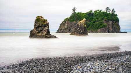 Long exposure of several sea stacks at Ruby Beach in Washington state.の写真素材